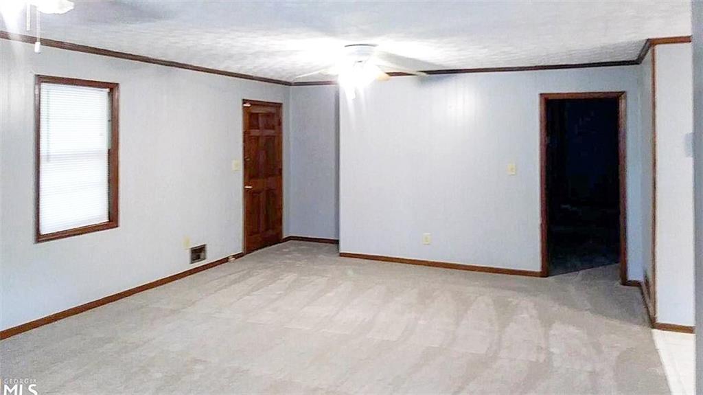 5844 Old Bill Cook Road Atlanta, GA 30349 - Photo 2 of 38