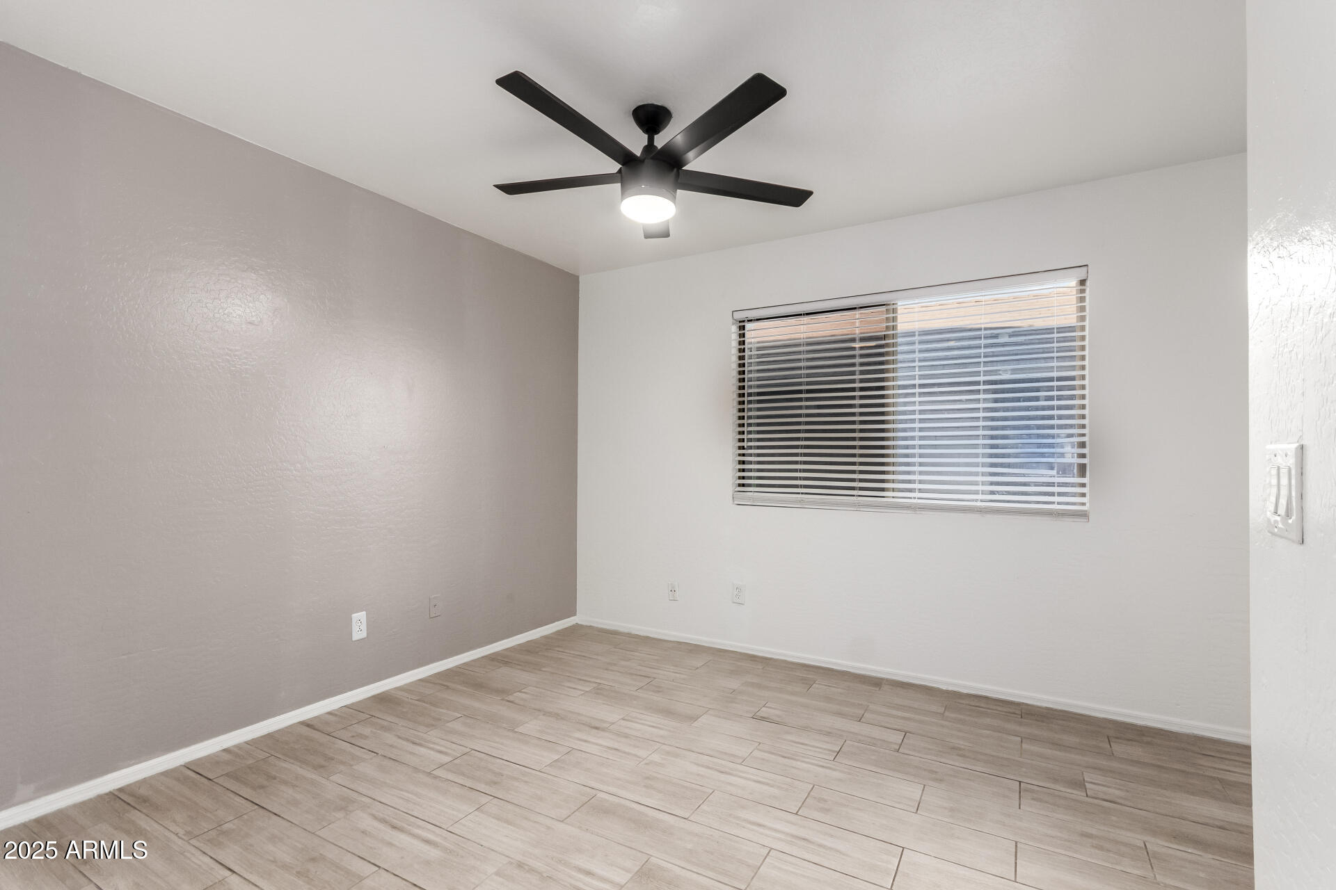 2507 West Desert Spring Way San Tan Valley, AZ 85144 - Photo 14 of 24 a view of an empty room with a window