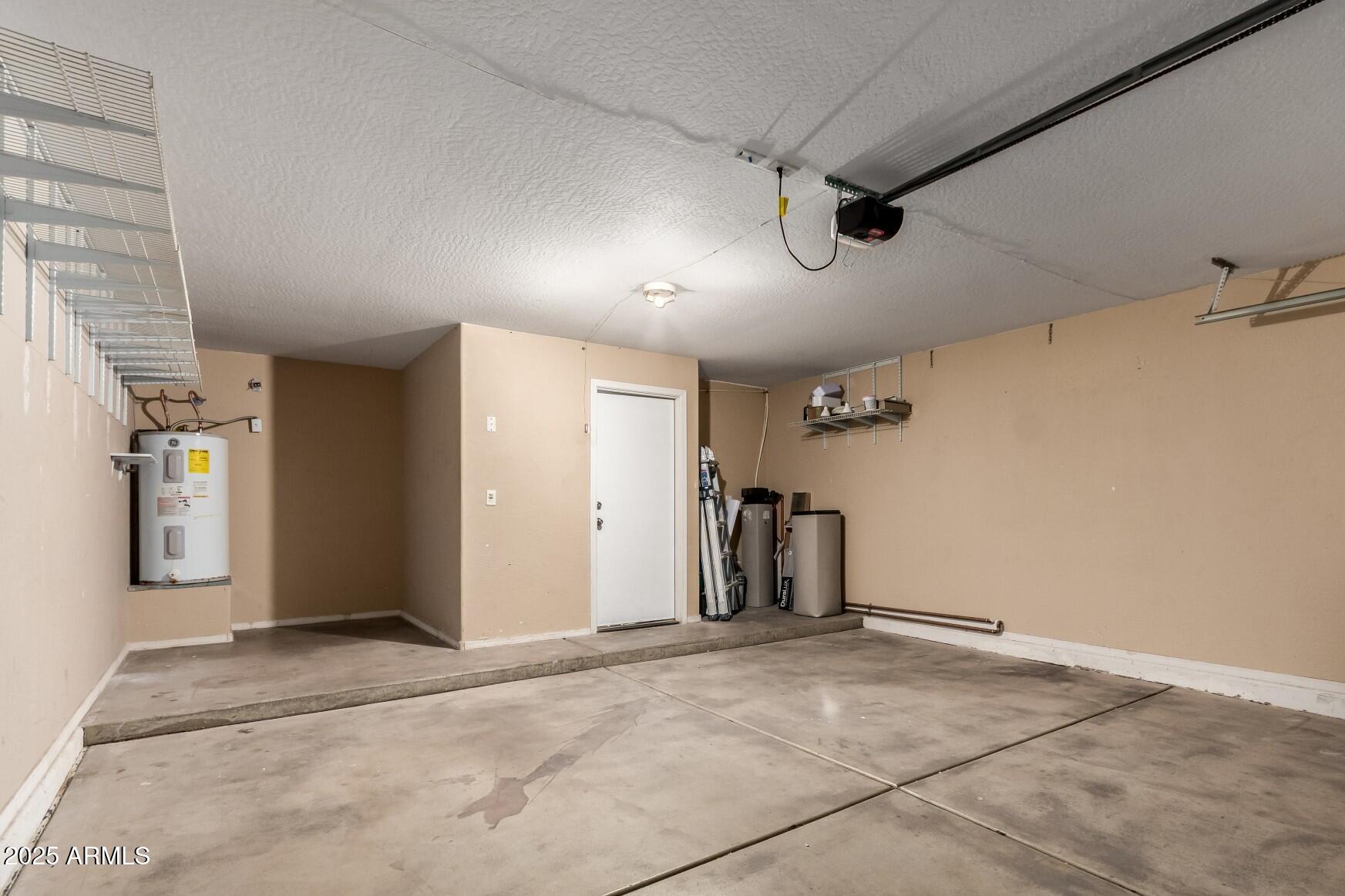 2507 West Desert Spring Way San Tan Valley, AZ 85144 - Photo 17 of 24 a view of a garage
