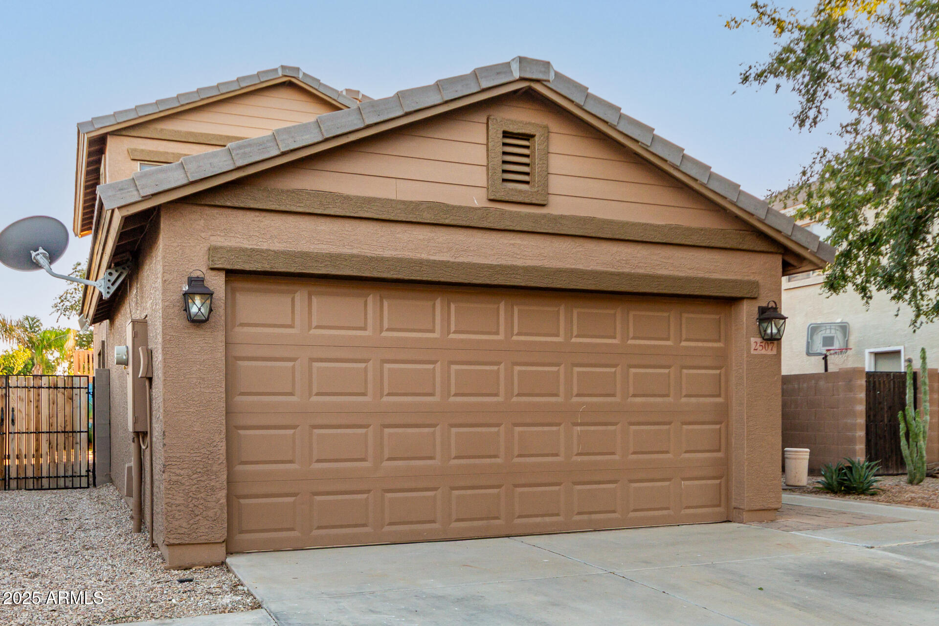 2507 West Desert Spring Way San Tan Valley, AZ 85144 - Photo 2 of 24 a front view of a house