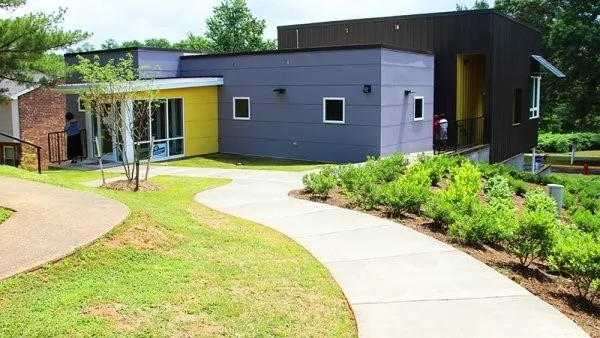 a view of a house with a swimming pool