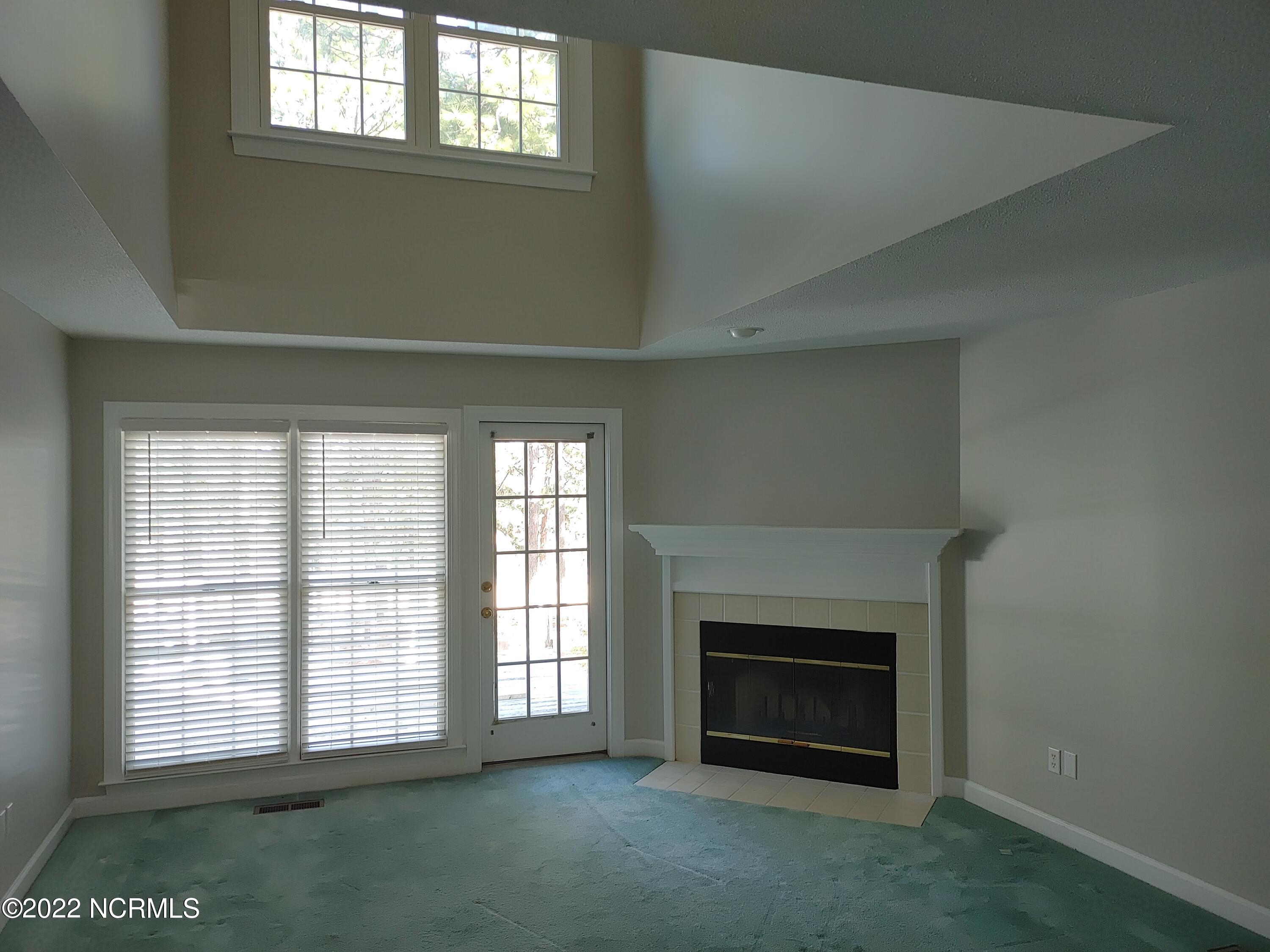 245 Knoll Road Southern Pines, NC 28387 - Photo 3 of 18 Family Room with Cathedral ceilings and FP