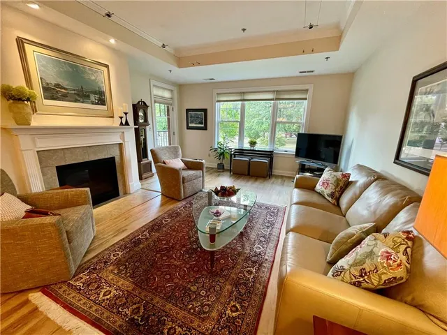 a spacious bedroom with a bed and a couch