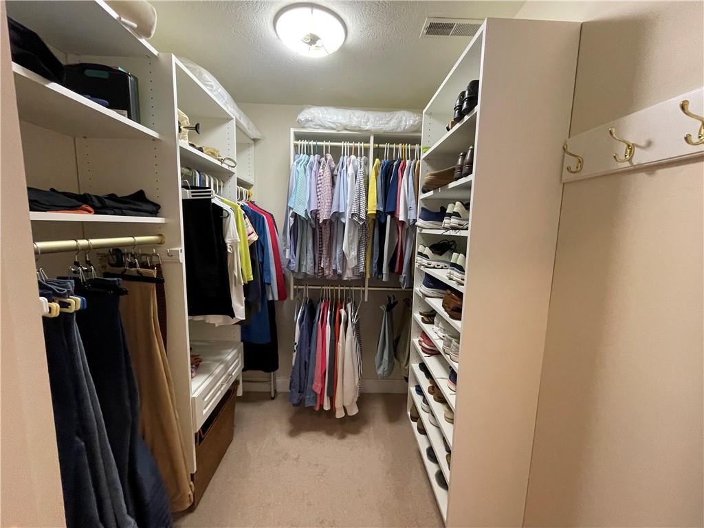 295 Market Street, Unit 123 Beaver, PA 15009 - Photo 16 of 27 a view of walk in closet with clothes