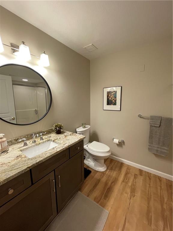 295 Market Street, Unit 123 Beaver, PA 15009 - Photo 20 of 27 a bathroom with a sink and a mirror