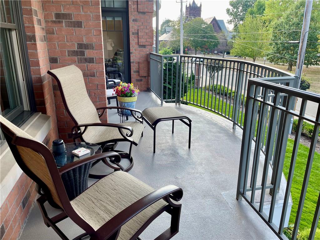295 Market Street, Unit 123 Beaver, PA 15009 - Photo 4 of 27 a view of a balcony with furniture