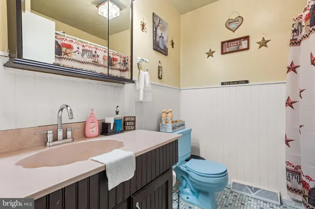a view of a deck with two chairs and a table