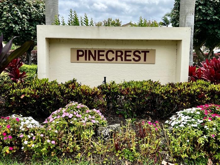 402 Pinecrest Circle, Unit D Jupiter, FL 33458 - Photo 24 of 24 Community Sign