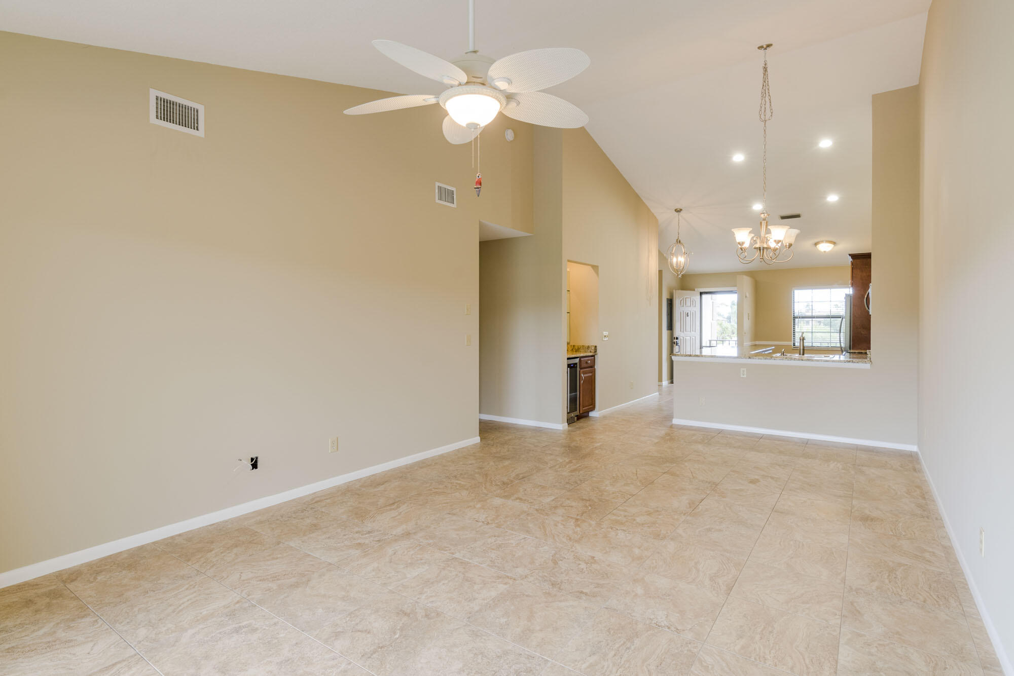 402 Pinecrest Circle, Unit D Jupiter, FL 33458 - Photo 10 of 24 Living & Dining Area