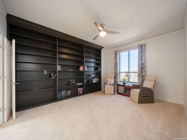 a room with furniture and a window