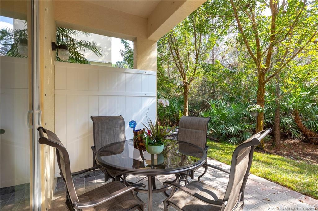 9574 Southwest Purple Martin Way Stuart, FL 34997 - Photo 26 of 32 a view of balcony and patio