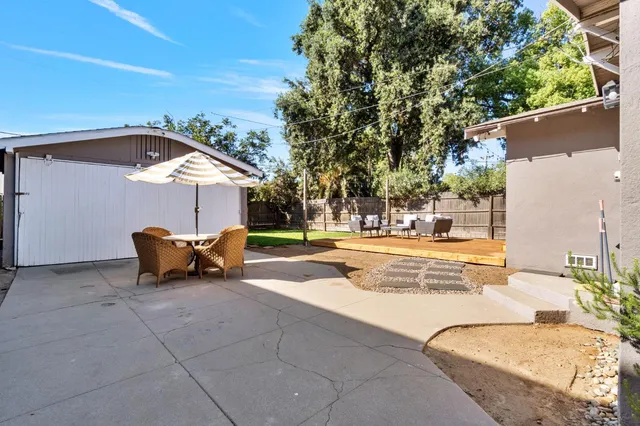 a view of a terrace with sitting area