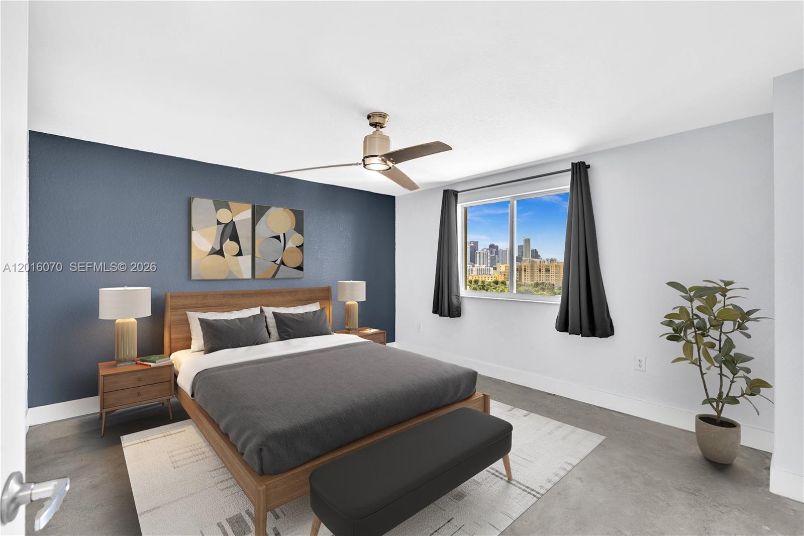 816 Northwest 11th Street, Unit 1208 Miami, FL 33136 - Photo 19 of 49 a bedroom with a bed and a chandelier