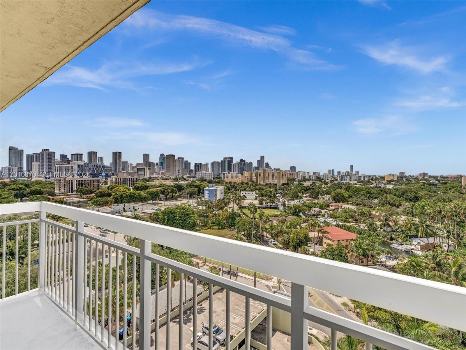 816 Northwest 11th Street, Unit 1208 Miami, FL 33136 - Photo 31 of 49 a view of city from a balcony