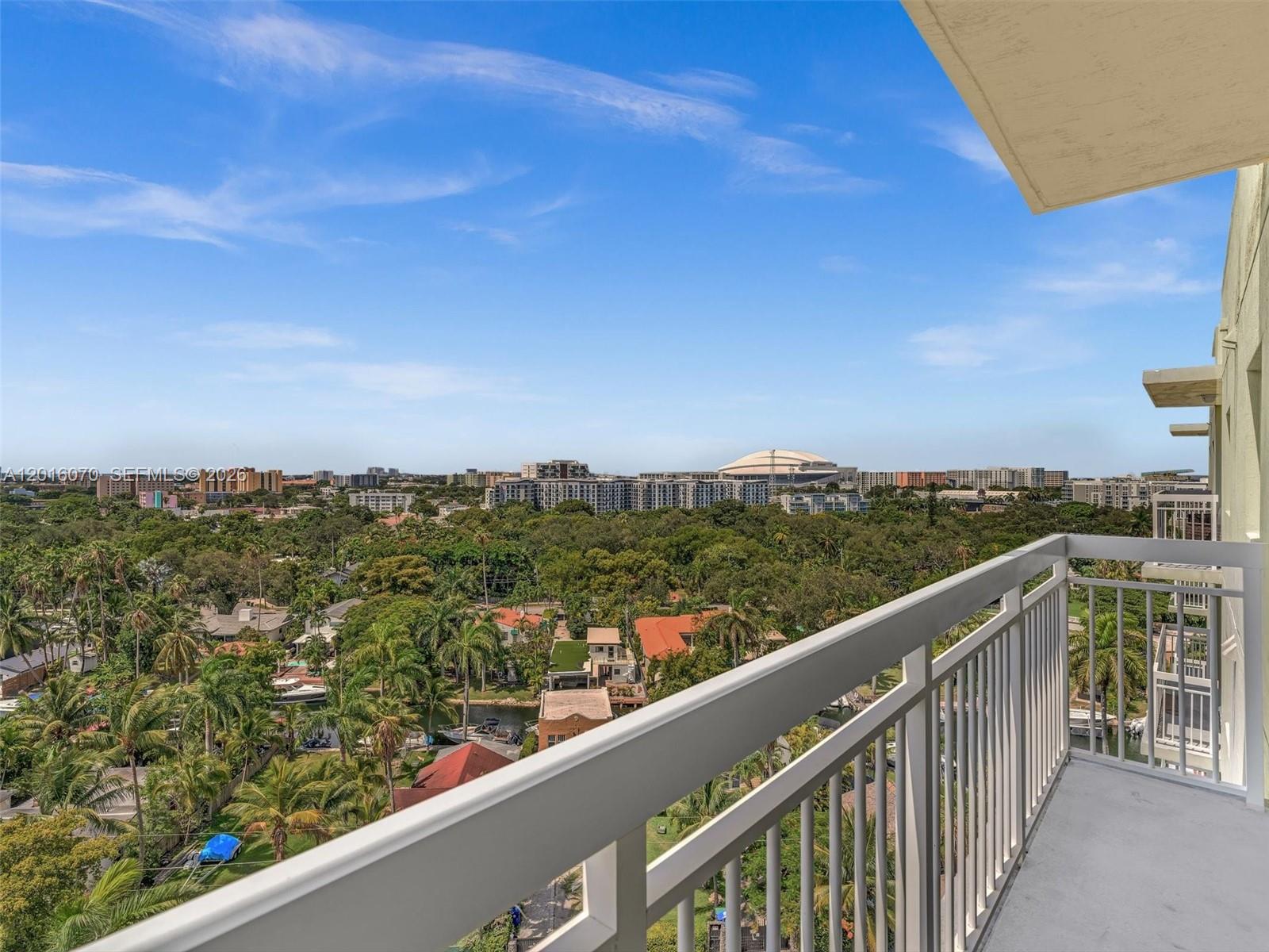 816 Northwest 11th Street, Unit 1208 Miami, FL 33136 - Photo 34 of 49 a view of city and mountain from a balcony