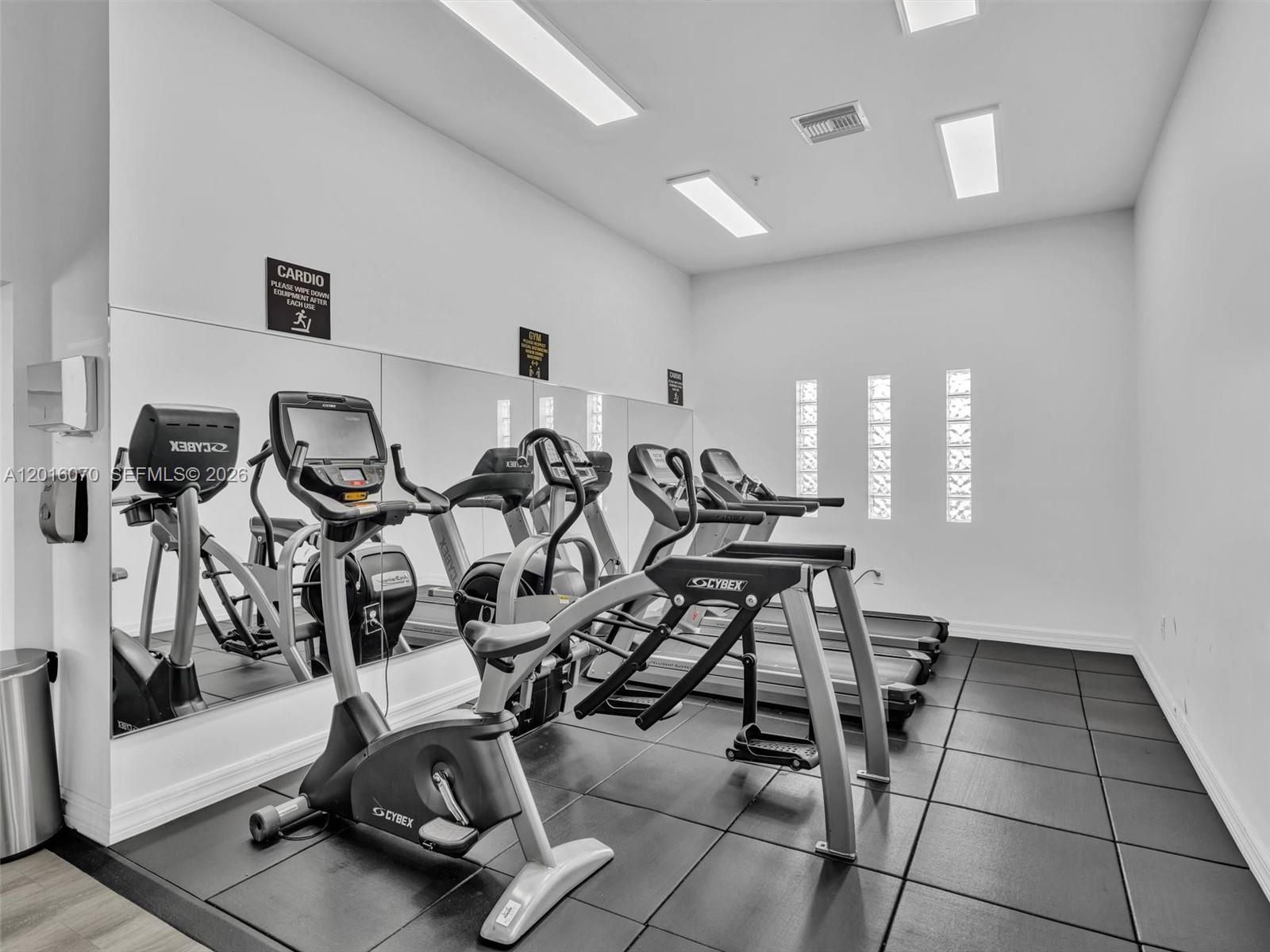 816 Northwest 11th Street, Unit 1208 Miami, FL 33136 - Photo 38 of 49 a view of a room with gym equipment