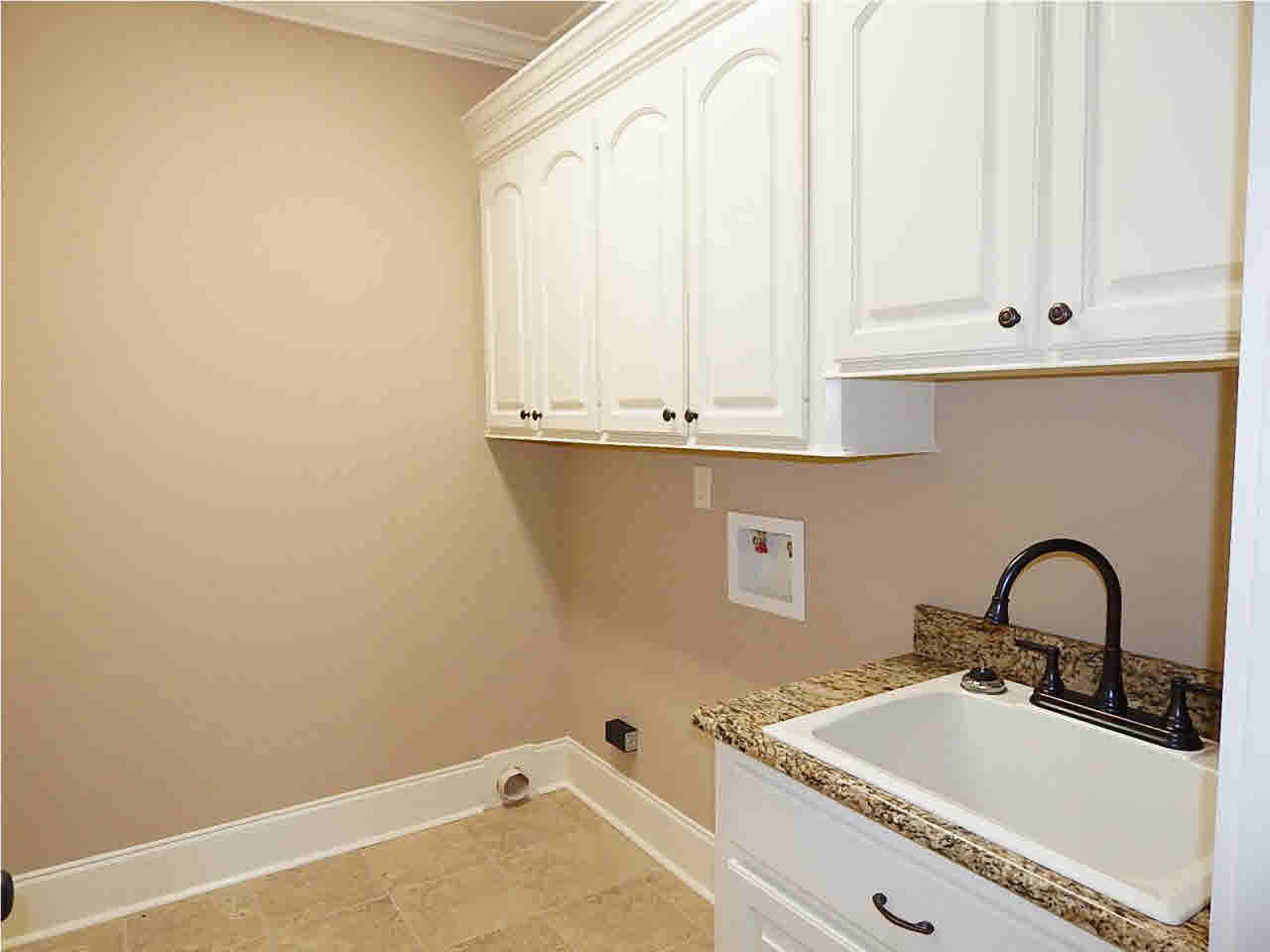 127 Busick Well Road Brandon, MS 39042 - Photo 31 of 34 Spacious laundry with utility sink