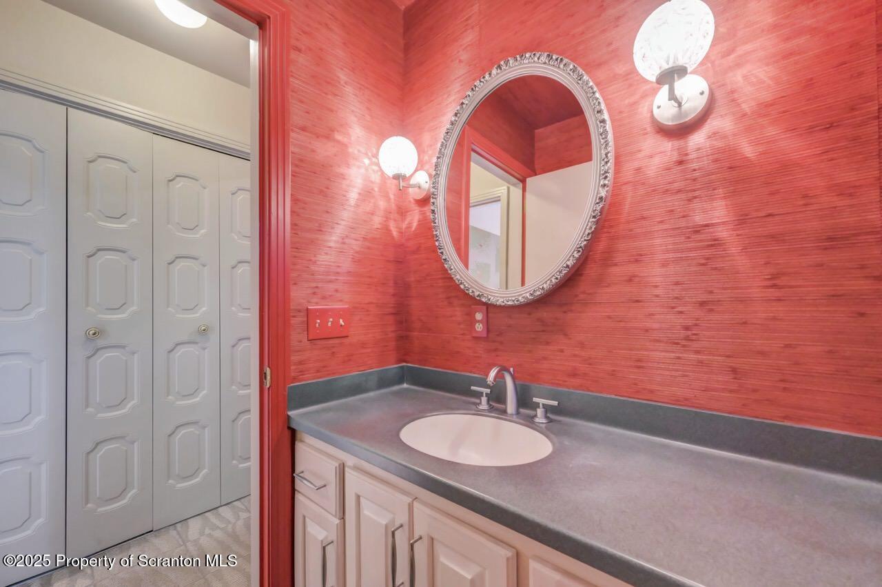 517 Grandview Street Clarks Summit, PA 18411 - Photo 19 of 86 a bathroom with a sink and a mirror