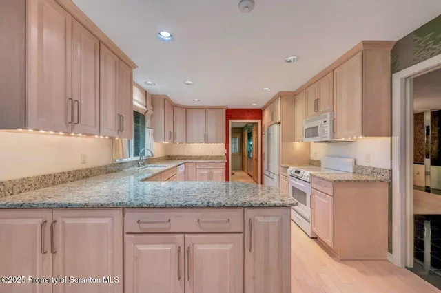 a view of front door with hallway