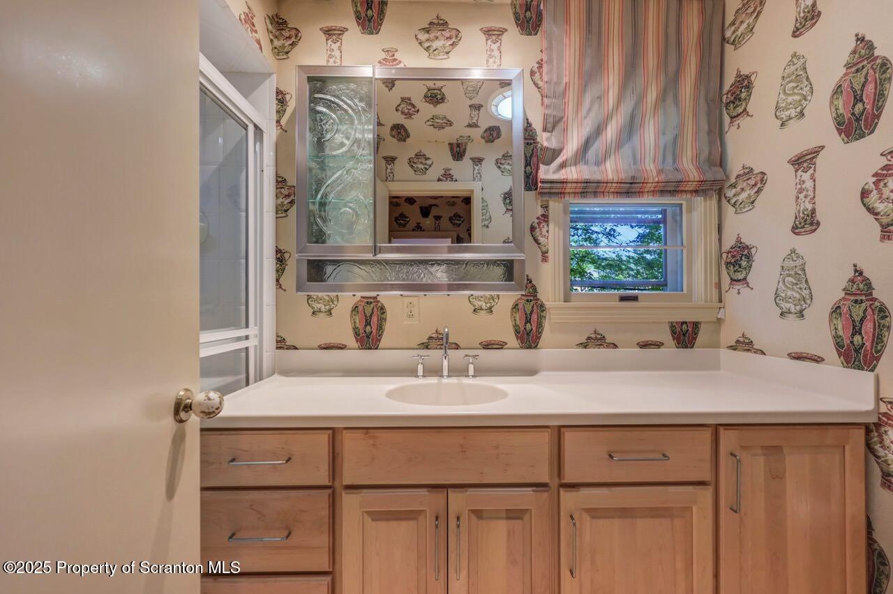 517 Grandview Street Clarks Summit, PA 18411 - Photo 39 of 86 a bathroom with a sink and a mirror