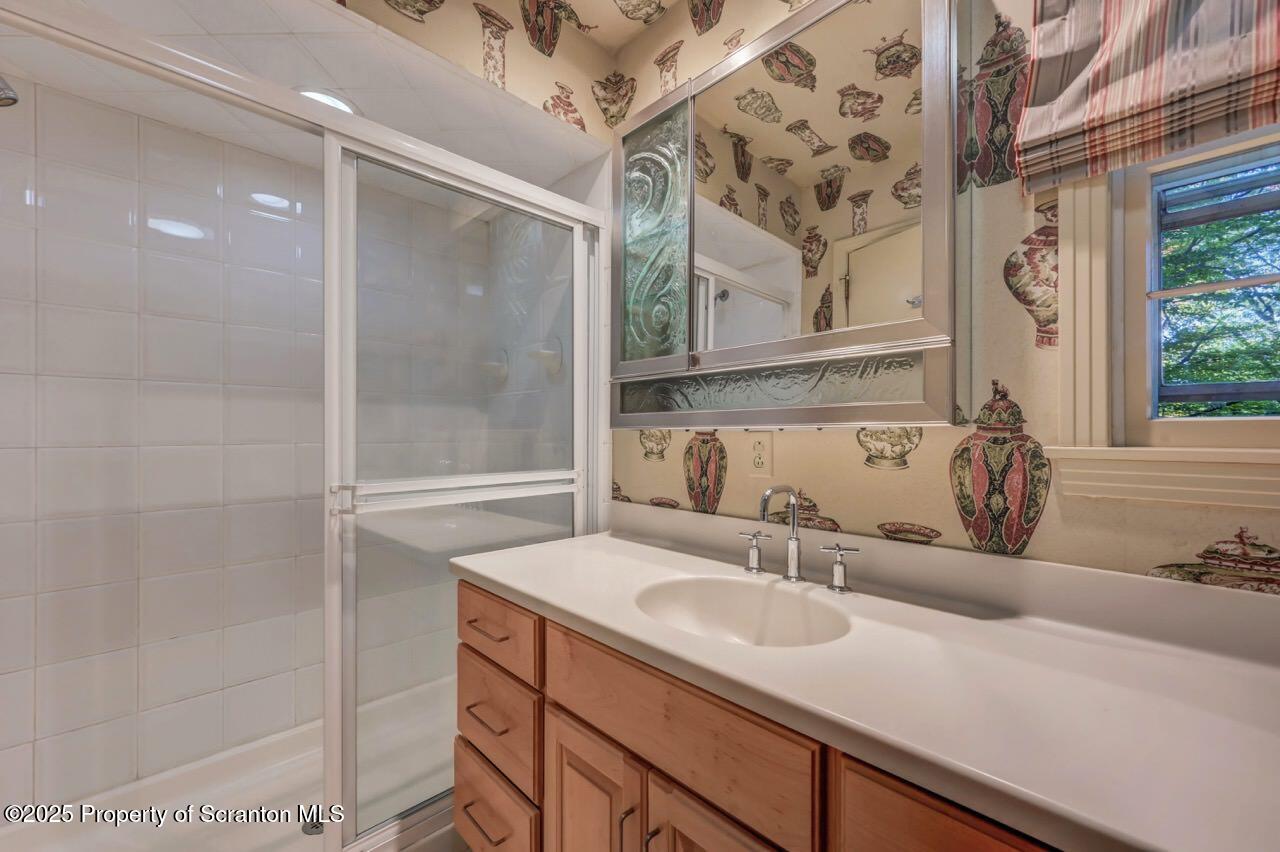 517 Grandview Street Clarks Summit, PA 18411 - Photo 40 of 86 a bathroom with a sink and a mirror