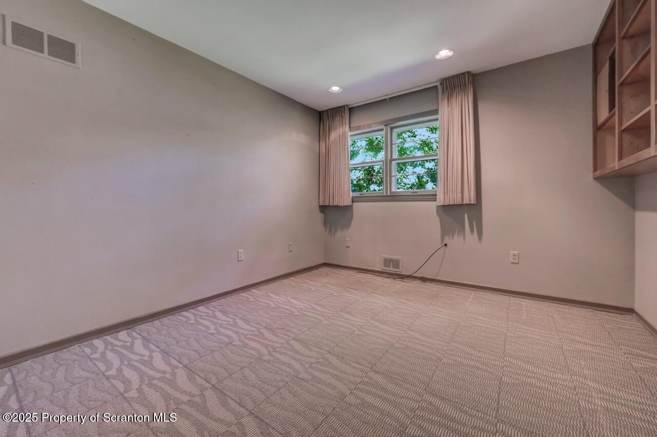 517 Grandview Street Clarks Summit, PA 18411 - Photo 45 of 86 an empty room with windows