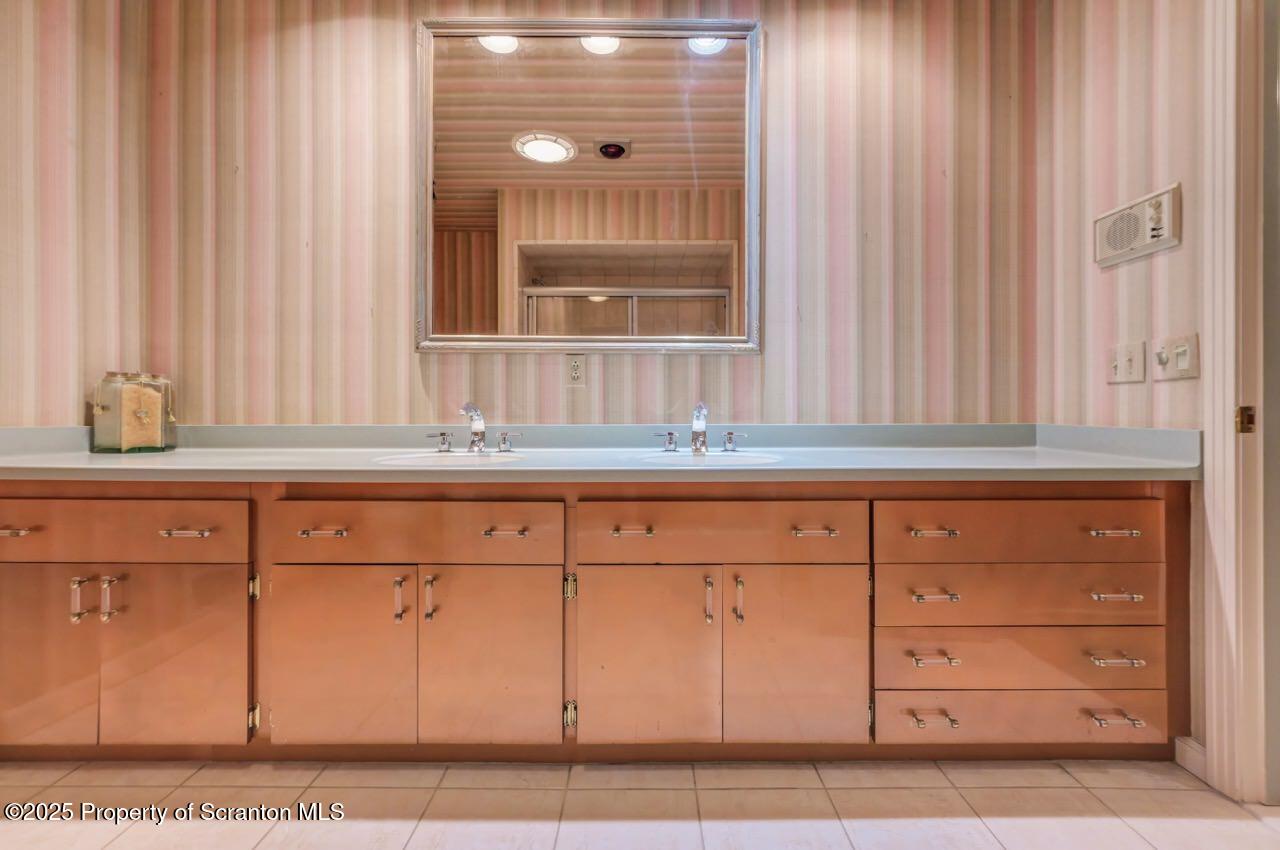 517 Grandview Street Clarks Summit, PA 18411 - Photo 48 of 86 a bathroom with a sink and a mirror
