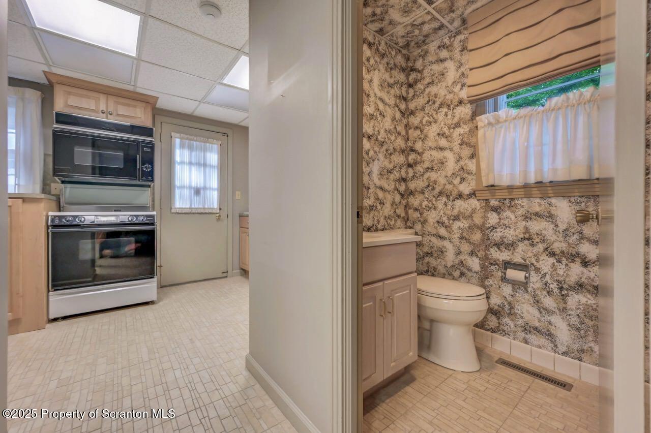 517 Grandview Street Clarks Summit, PA 18411 - Photo 56 of 86 a bathroom with a toilet and a sink