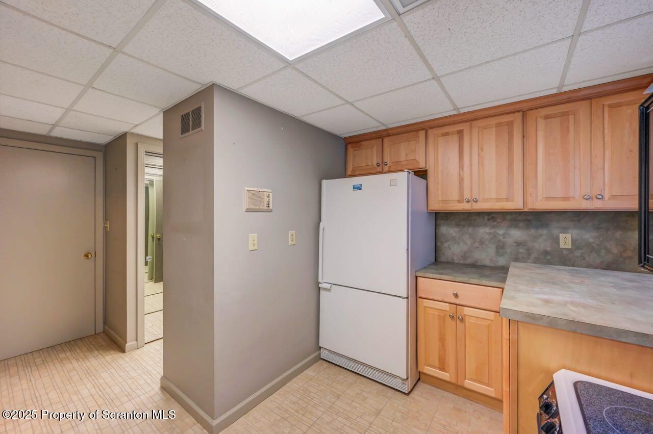 517 Grandview Street Clarks Summit, PA 18411 - Photo 61 of 86 a view of a kitchen with refrigerator and cabinet