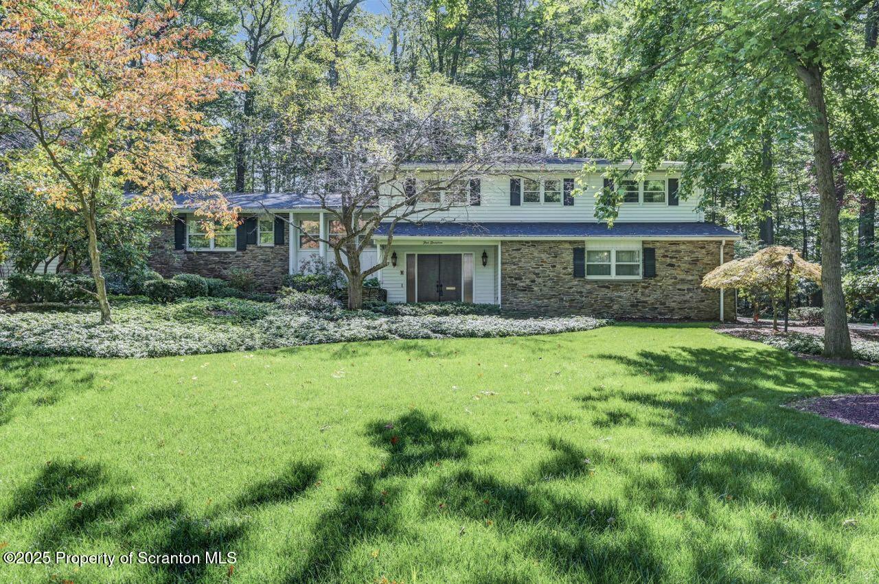 517 Grandview Street Clarks Summit, PA 18411 - Photo 84 of 86 a front view of house with yard and green space