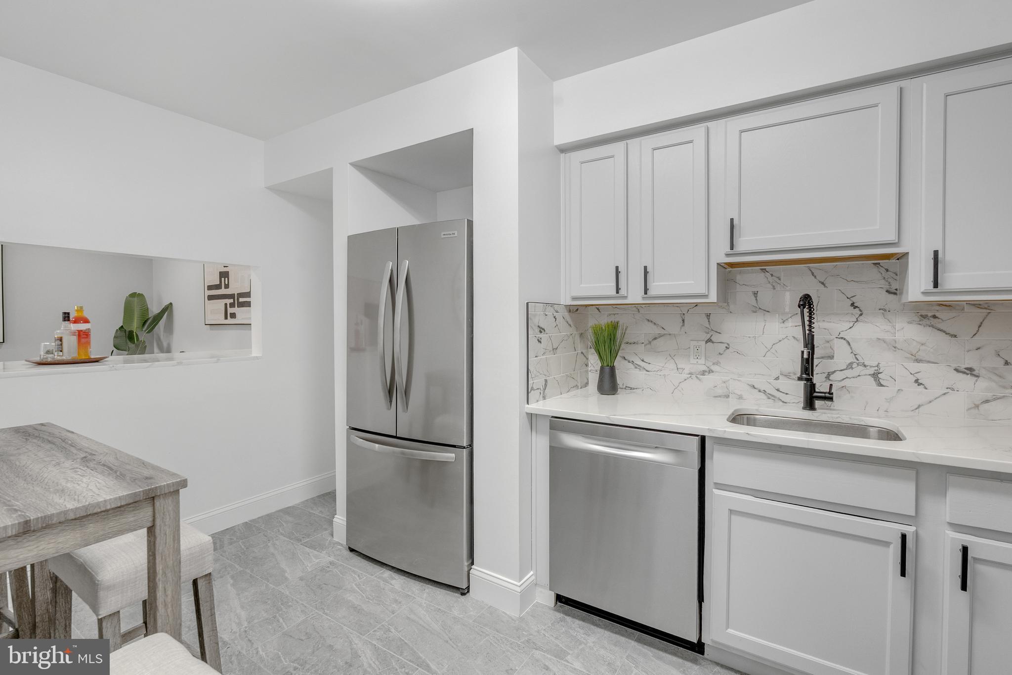 201 Timber Creek Road Clementon, NJ 08021 - Photo 26 of 62 a kitchen with appliances cabinets and a sink
