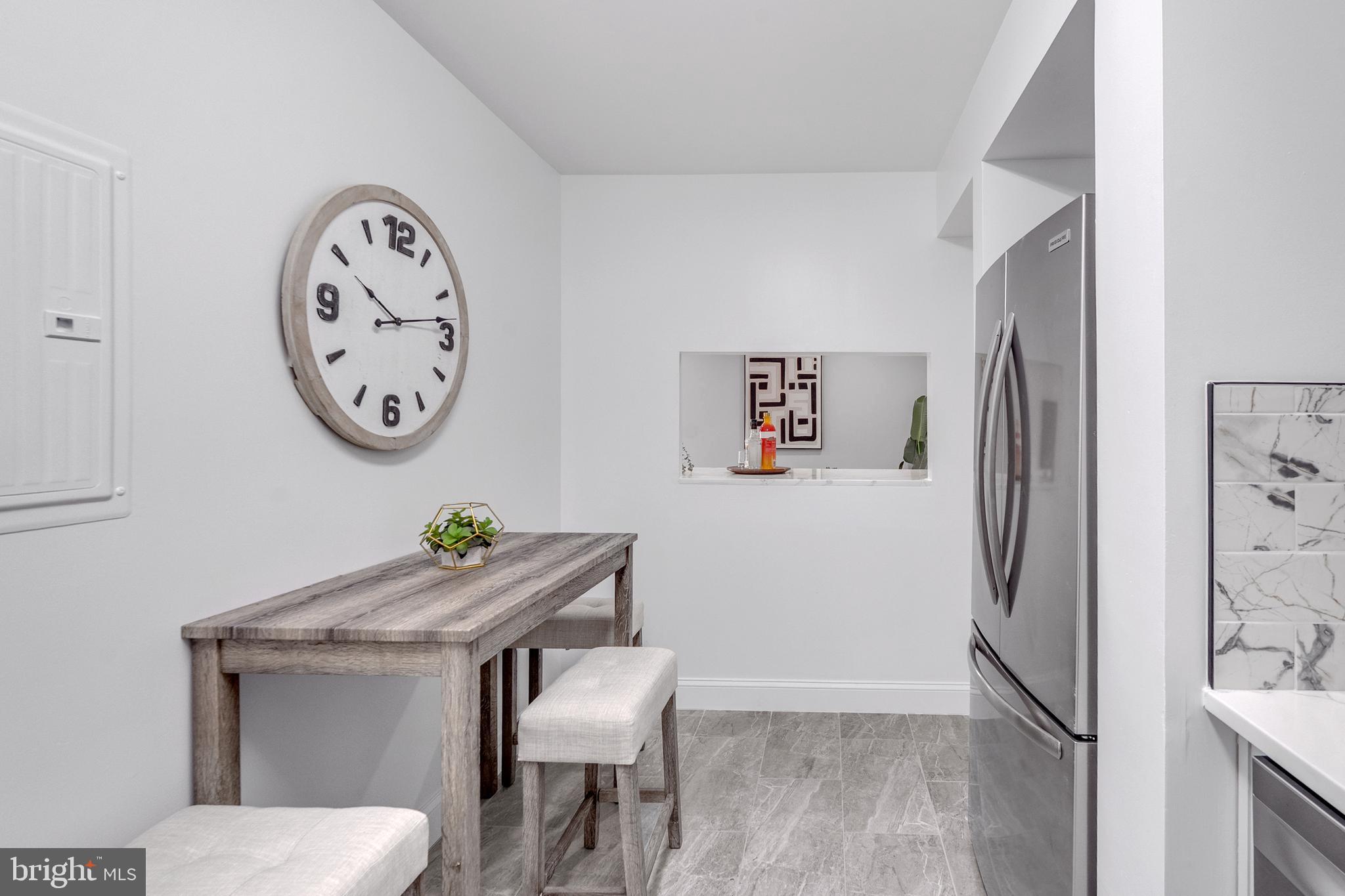 201 Timber Creek Road Clementon, NJ 08021 - Photo 27 of 62 a view of a hallway with elevator and a refrigerator