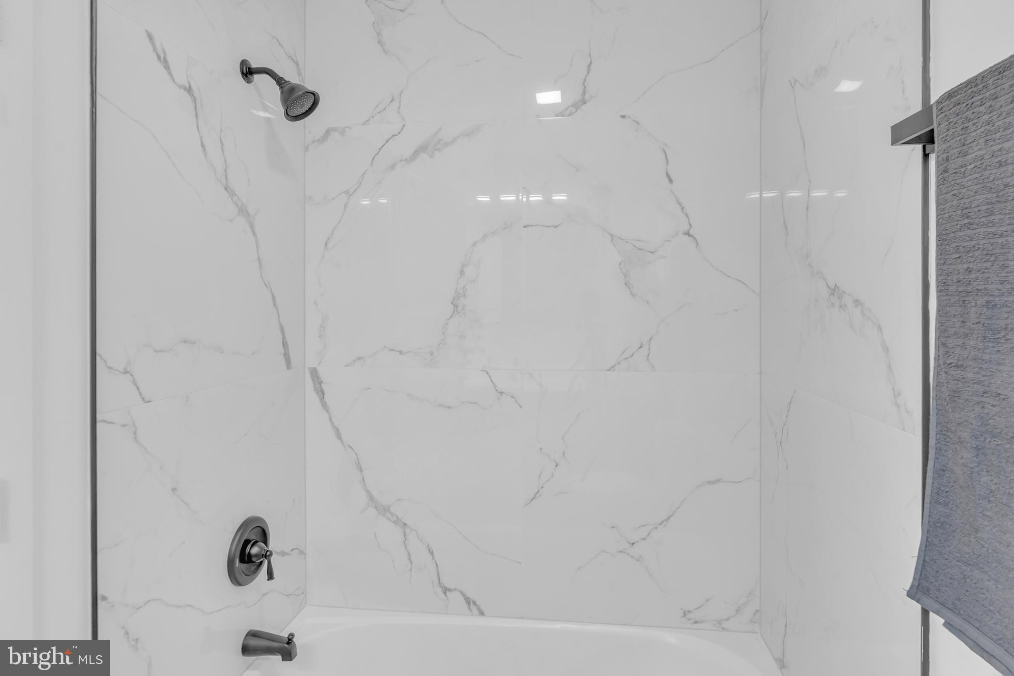 201 Timber Creek Road Clementon, NJ 08021 - Photo 36 of 62 a bathroom with a bathtub and a shower