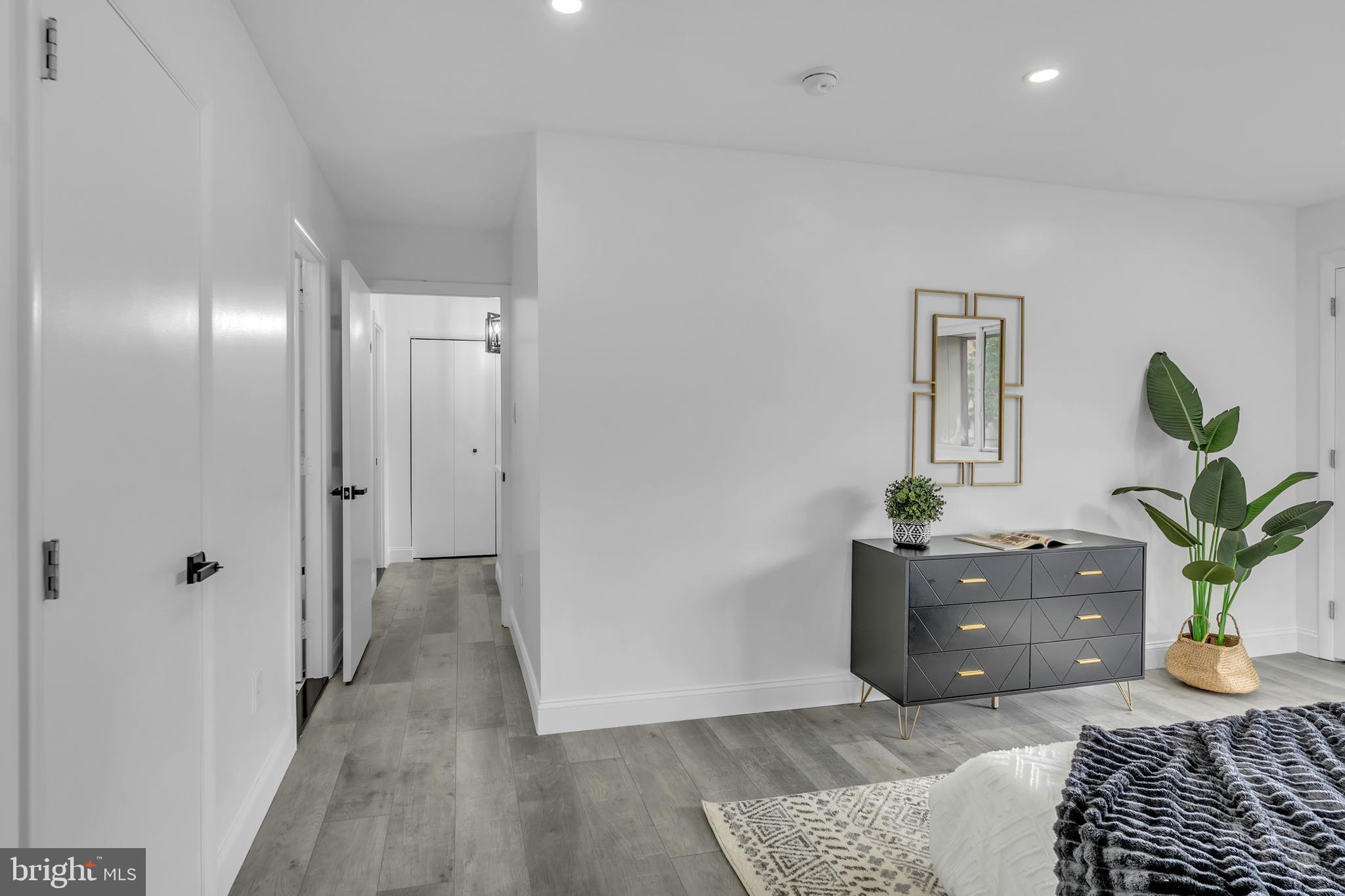 201 Timber Creek Road Clementon, NJ 08021 - Photo 41 of 62 a living room with furniture and a potted plant