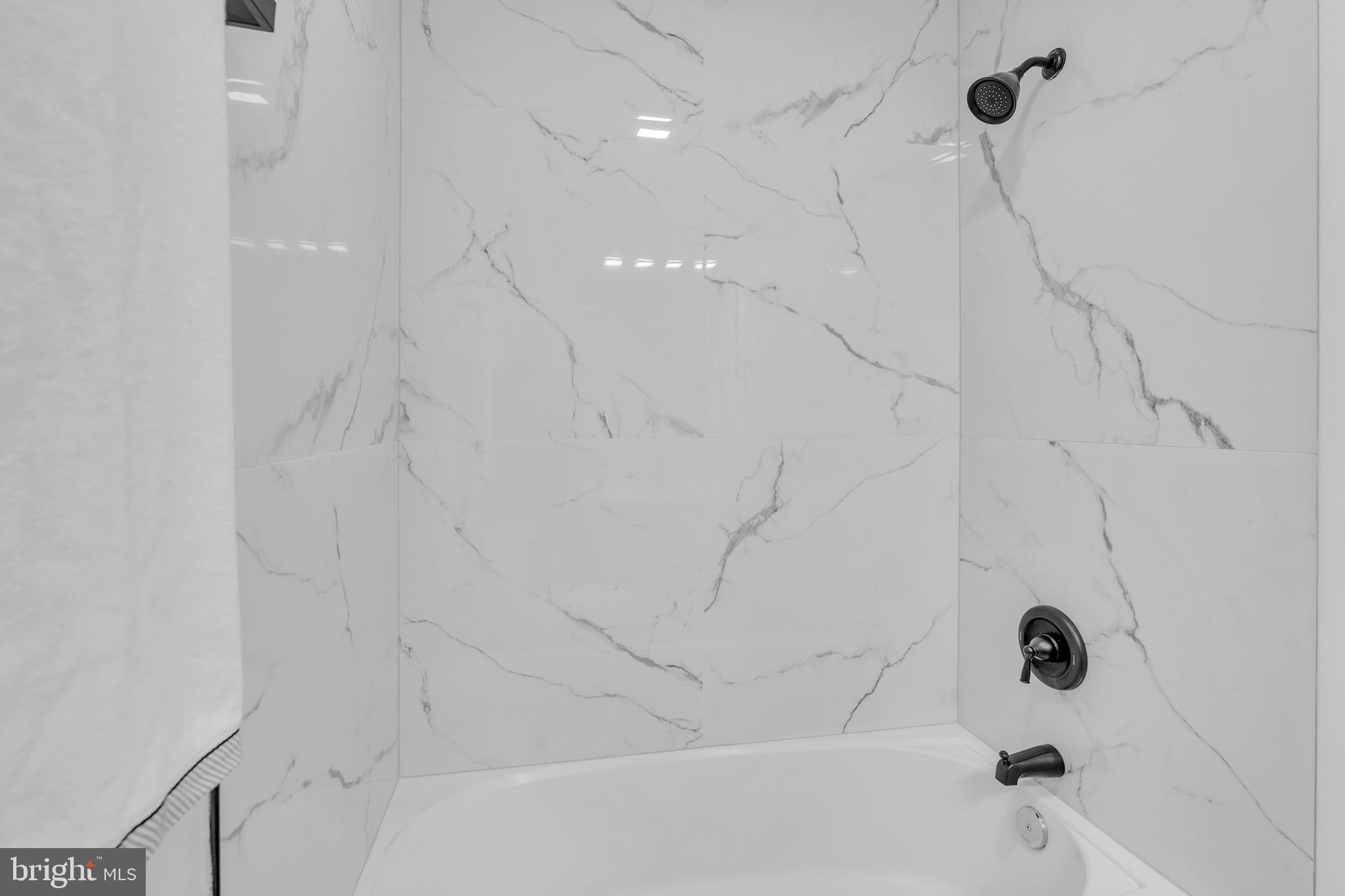 201 Timber Creek Road Clementon, NJ 08021 - Photo 50 of 62 a bathroom with a bathtub and shower