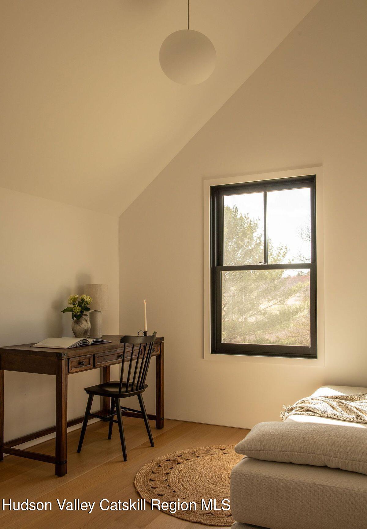 251 Viewmont Road Germantown, NY 12526 - Photo 19 of 22 a living room with furniture and a window