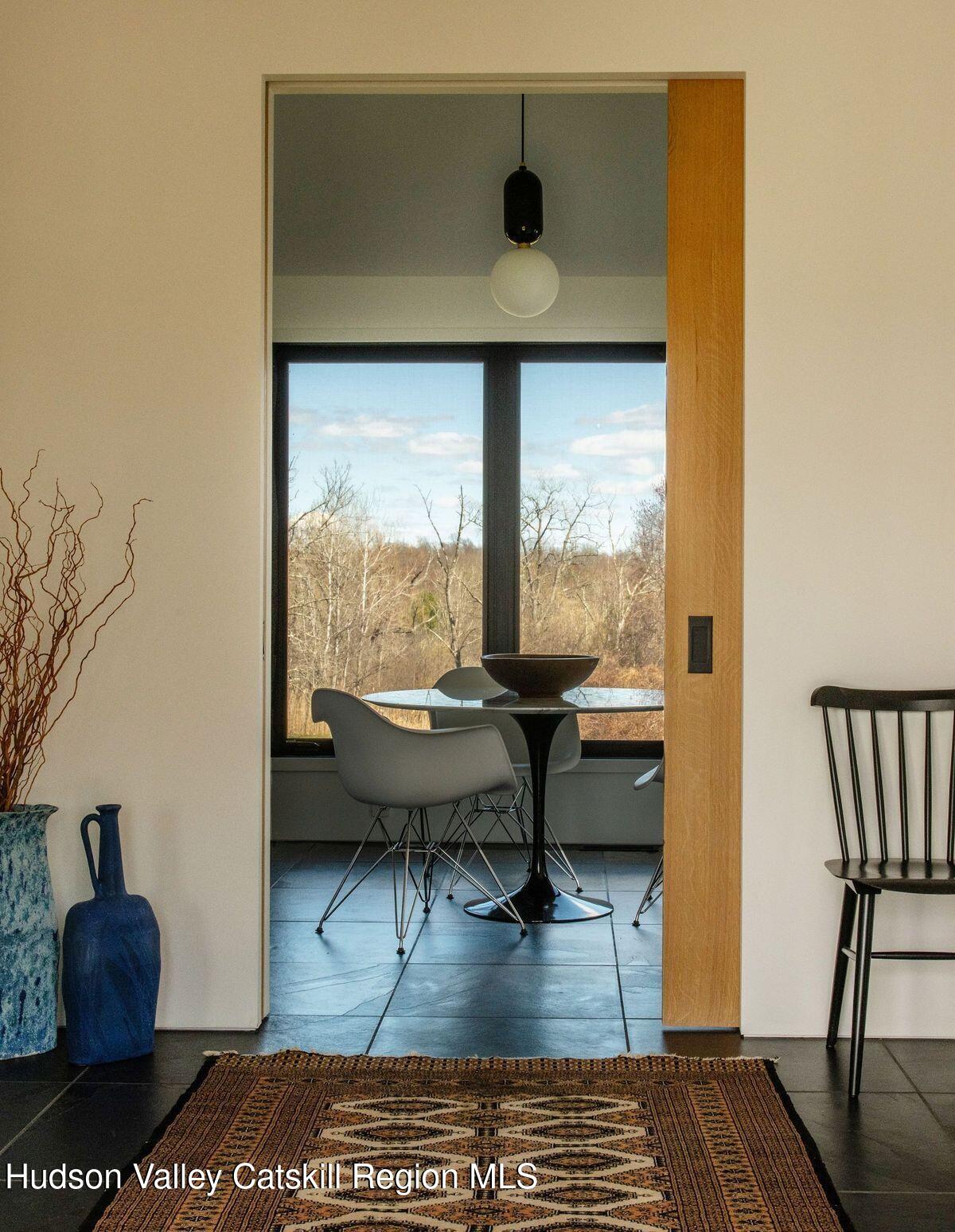 251 Viewmont Road Germantown, NY 12526 - Photo 7 of 22 a living room with furniture and a window