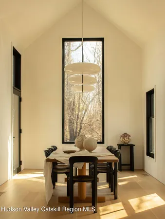 a view of a livingroom with furniture and window