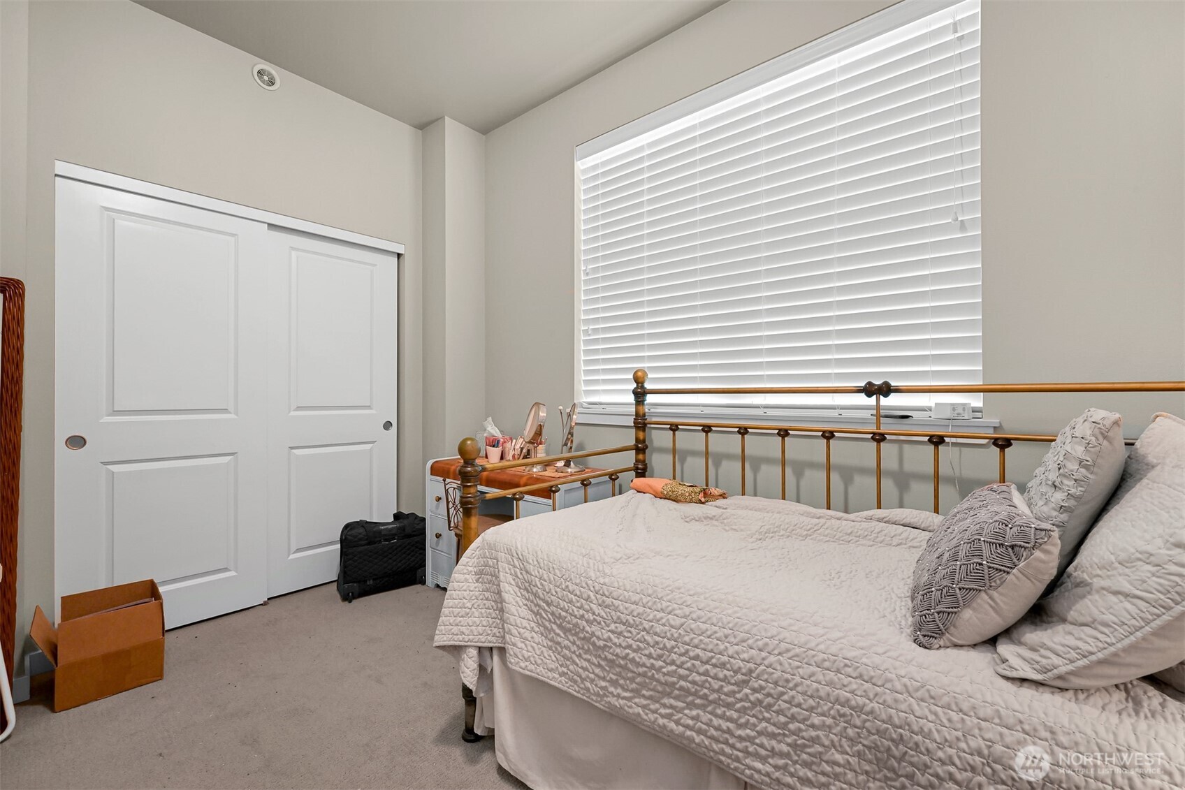 8844 Depot Road, Unit B101 Lynden, WA 98264 - Photo 15 of 30 a bedroom with a bed and a dresser