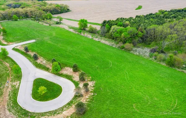 a view of a golf course with a swimming pool