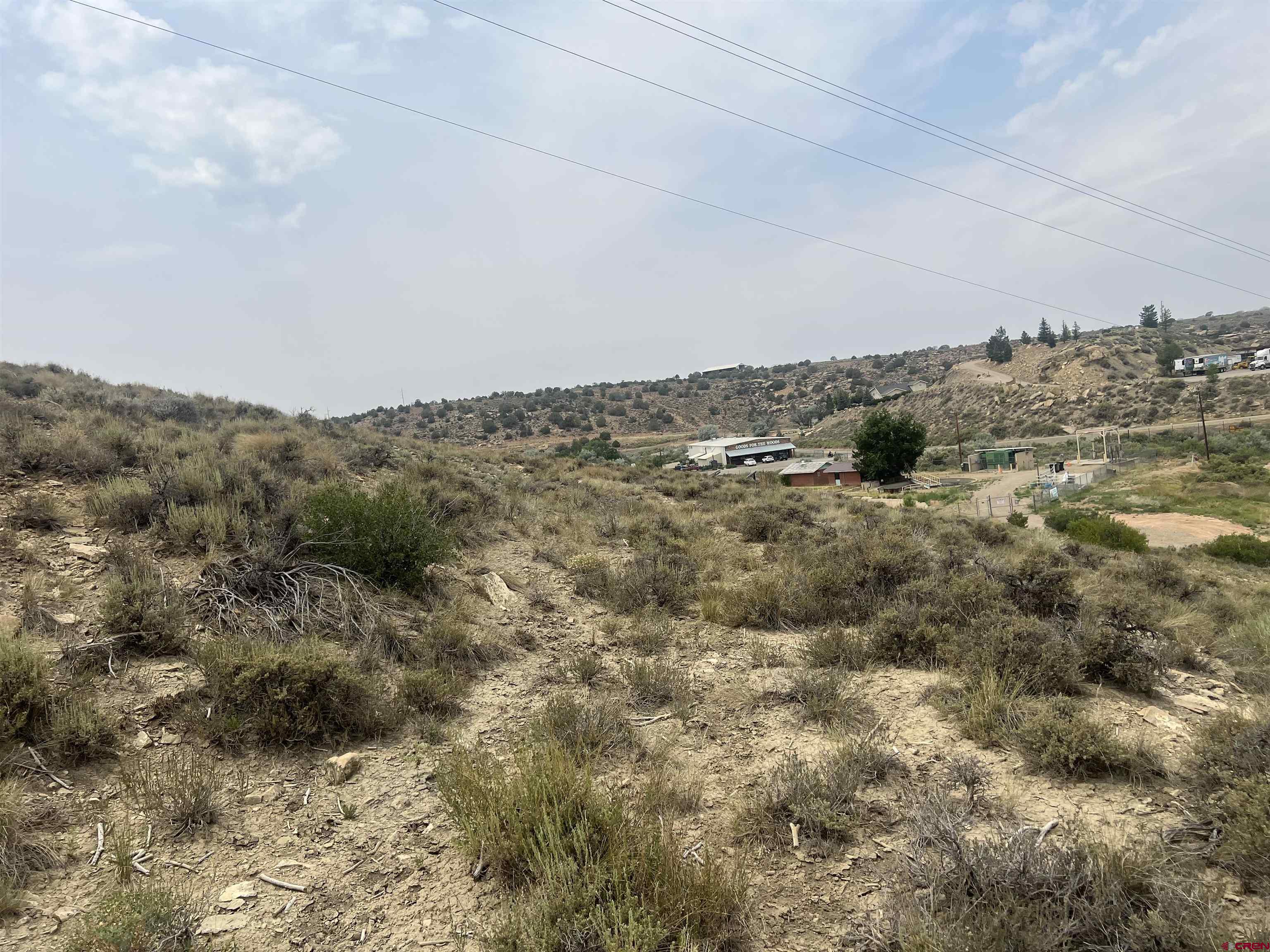 491 North Highway 491 Cortez, CO 81321 - Photo 5 of 6 a view of a large building with mountains in the background