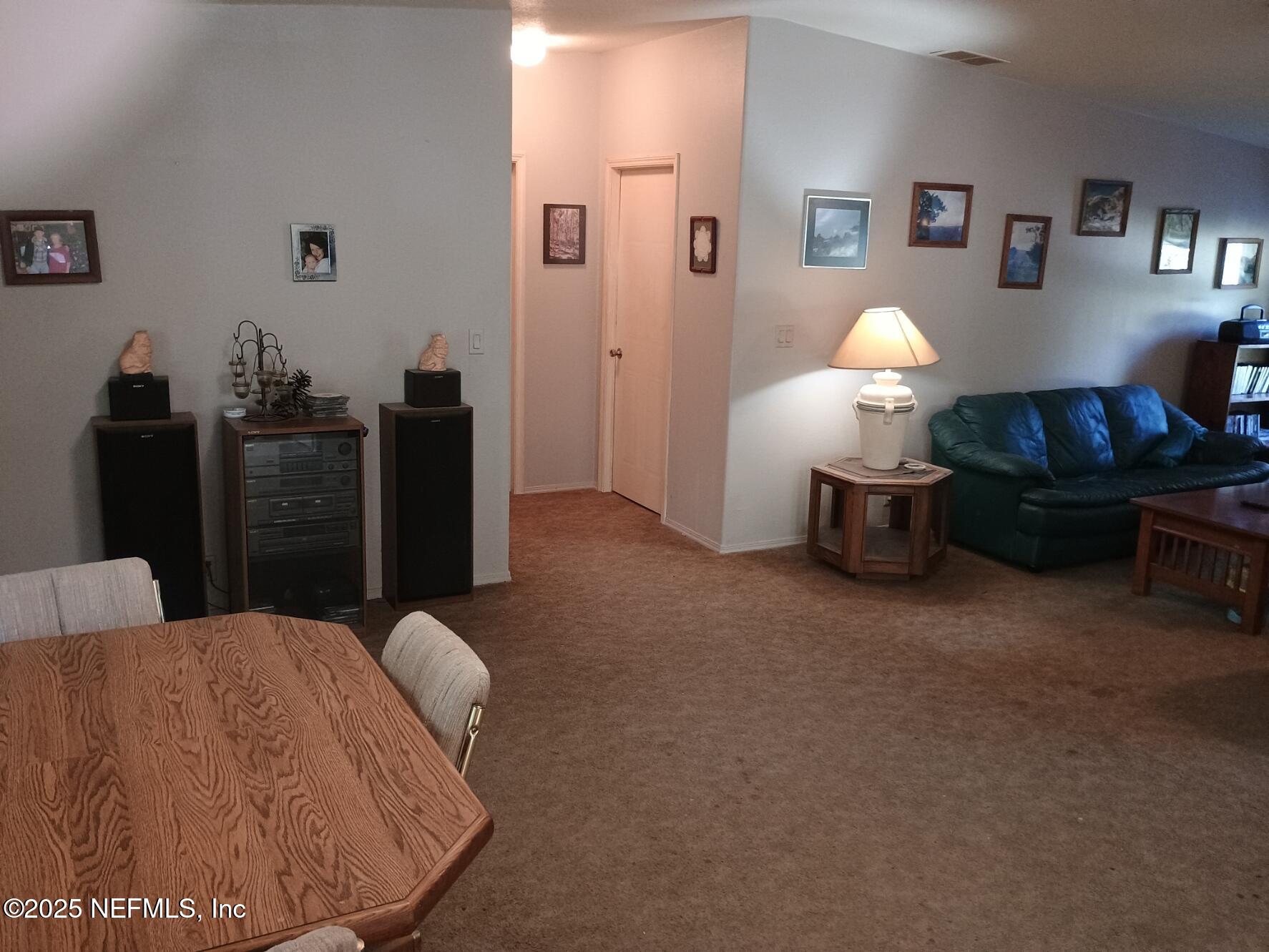136 Boots Road Melrose, FL 32666 - Photo 15 of 40 a view of a livingroom with furniture
