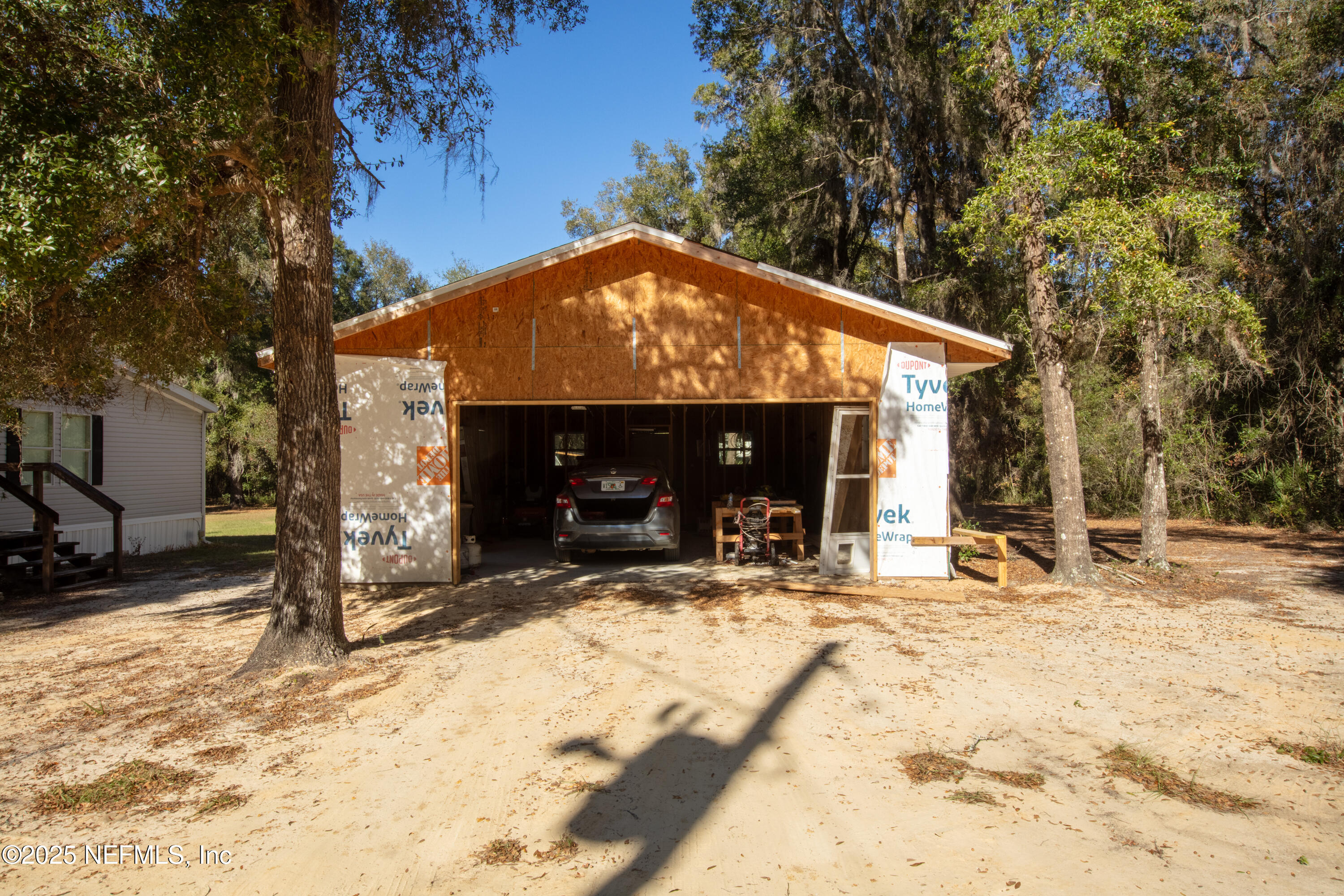 136 Boots Road Melrose, FL 32666 - Photo 34 of 40 a view of a house with snow in front of it