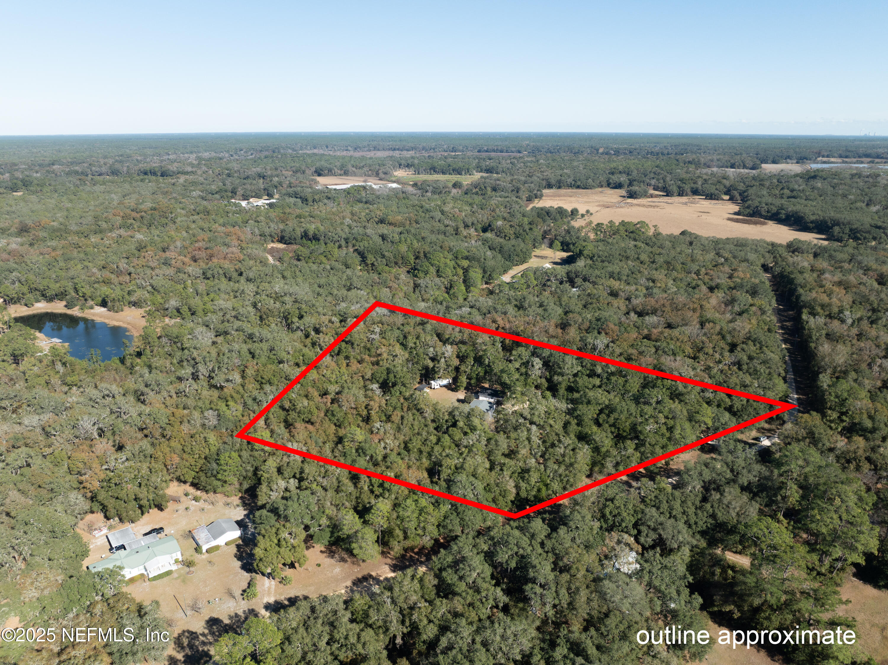 136 Boots Road Melrose, FL 32666 - Photo 38 of 40 an aerial view of a houses with an outdoor space