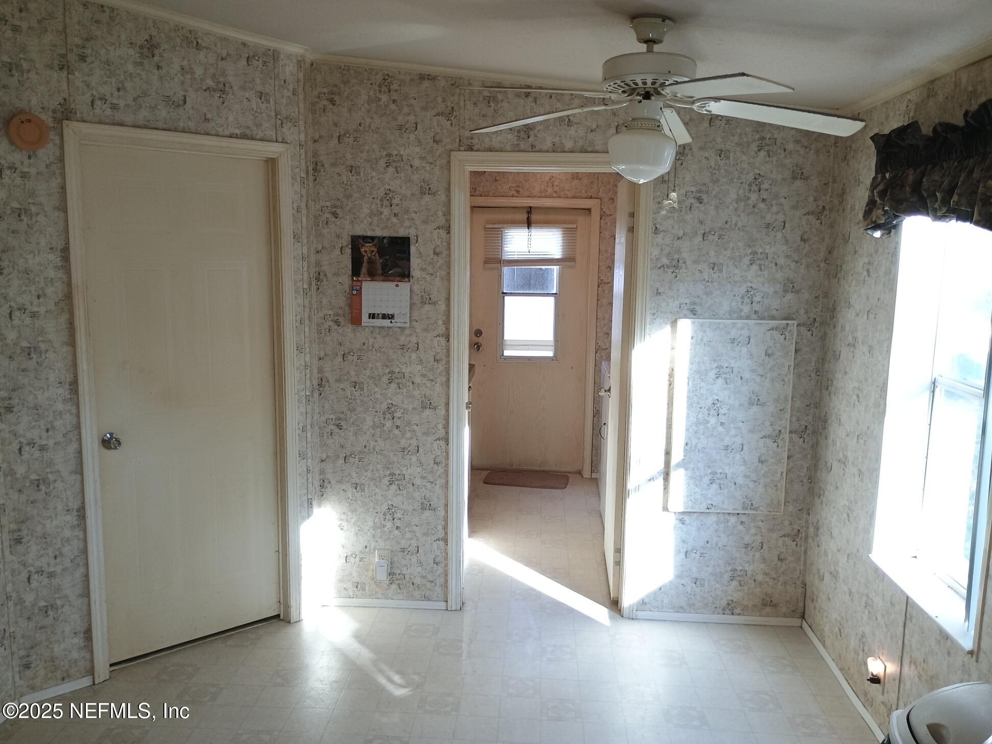 136 Boots Road Melrose, FL 32666 - Photo 9 of 40 a view of a bathroom with a glass door shower