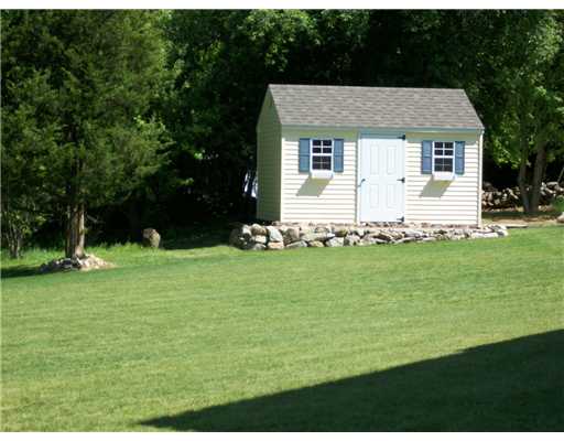 179 Blackrock Road Coventry, RI 02816 - Photo 3 of 12 Yard/Garden. Half Acre Lot. Beautiful grassy back yard with a Great Garden Shed.