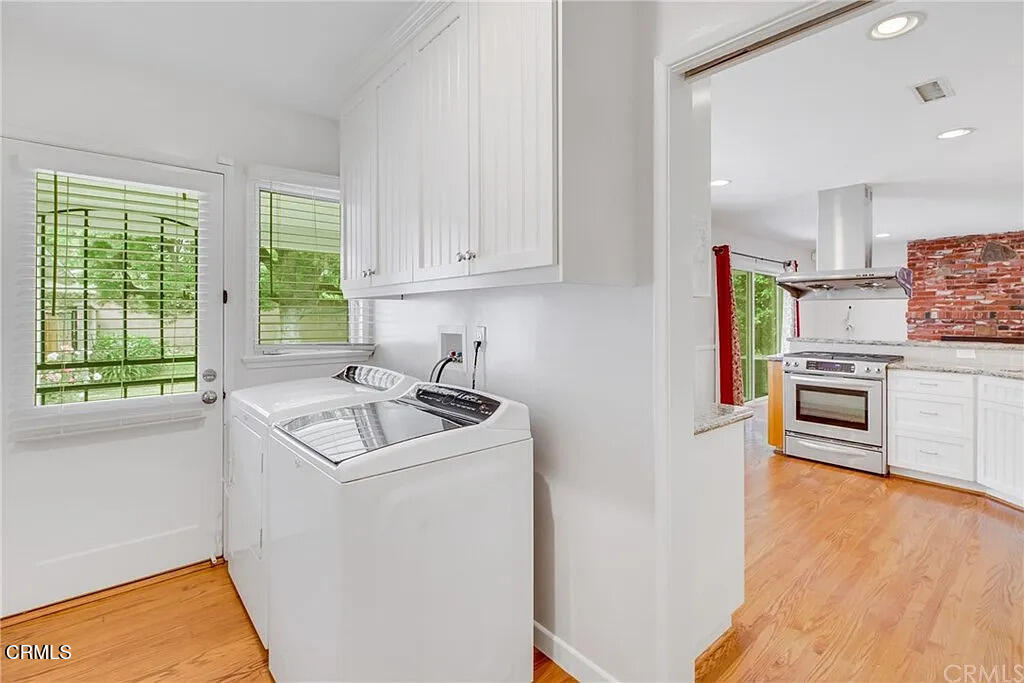 303 East Las Flores Avenue Arcadia, CA 91006 - Photo 20 of 37 a kitchen with appliances cabinets and a sink