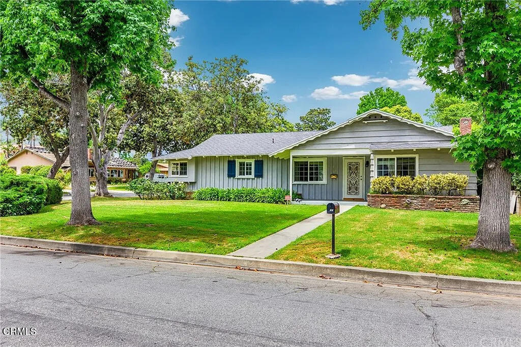 303 East Las Flores Avenue Arcadia, CA 91006 - Photo 2 of 37 a front view of a house with a yard