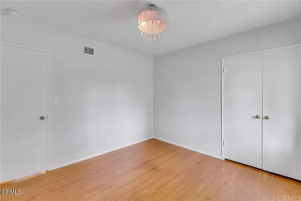 303 East Las Flores Avenue Arcadia, CA 91006 - Photo 22 of 37 a view of an empty room and chandelier fan