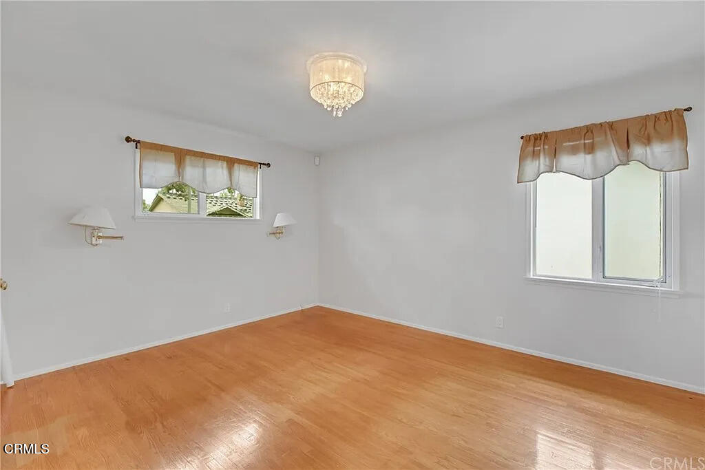 303 East Las Flores Avenue Arcadia, CA 91006 - Photo 27 of 37 a view of empty room with windows